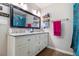 Bathroom vanity with double sinks, large mirror and shelving at 7805 Rock Rose Ln, Fairburn, GA 30213