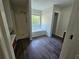 Bathroom featuring new flooring, walk-in shower, tub, and vanity at 1857 Oak Hill Springs Blvd, Lithonia, GA 30058