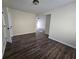 Spacious living room with new flooring and bright lighting at 1857 Oak Hill Springs Blvd, Lithonia, GA 30058