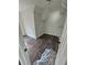 Walk-in closet featuring new flooring, overhead light, and shelving at 1857 Oak Hill Springs Blvd, Lithonia, GA 30058
