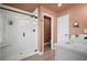 Modern bathroom with walk-in shower, white vanity, and contemporary fixtures at 1914 Carovel Way, Kennesaw, GA 30144