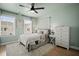 Cozy bedroom with a comfortable queen-size bed and soft, natural light at 1914 Carovel Way, Kennesaw, GA 30144