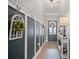 Stylish entryway with decorative wall hooks, console table, and wood-look flooring at 1914 Carovel Way, Kennesaw, GA 30144