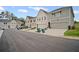 Street view featuring townhome exteriors with attached garages and landscaping at 1914 Carovel Way, Kennesaw, GA 30144