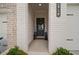 Inviting front entrance with decorative wreath and stylish black door at 1914 Carovel Way, Kennesaw, GA 30144