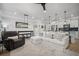 Spacious open-concept living room with fireplace and access to the kitchen at 1914 Carovel Way, Kennesaw, GA 30144