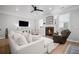 Bright living room with fireplace, hardwood floors, and comfortable seating at 1914 Carovel Way, Kennesaw, GA 30144