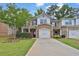Charming townhome with brick accents, landscaping, and a well-maintained lawn at 3461 Dianthus Ln, Lawrenceville, GA 30044