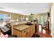 Open concept kitchen with wooden cabinets and granite countertops at 3461 Dianthus Ln, Lawrenceville, GA 30044