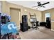 Open living room with neutral walls, ceiling fan and plenty of space at 3461 Dianthus Ln, Lawrenceville, GA 30044