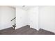 Bedroom with hardwood floors, two closets and stairway access at 354 Olmstead Way # 27, Alpharetta, GA 30022