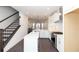 Open kitchen showcasing a center island, stainless steel appliances, and modern pendant lighting at 354 Olmstead Way # 27, Alpharetta, GA 30022