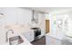 Gourmet kitchen featuring stainless appliances, quartz countertops, and tiled backsplash at 354 Olmstead Way # 27, Alpharetta, GA 30022