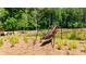 Unique metal insect sculpture in the community with pond and green surroundings at 354 Olmstead Way # 27, Alpharetta, GA 30022