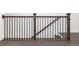 Elegant staircase with dark wood railing and balusters leading to the upper level at 354 Olmstead Way # 27, Alpharetta, GA 30022