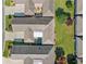 Aerial view showcases courtyard pool, back patios and landscaping at 406 Genevieve Dr, Canton, GA 30114
