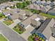 An aerial view of the property showcasing its landscaped grounds and surrounding neighborhood with mature trees at 406 Genevieve Dr, Canton, GA 30114