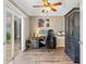 Serene home office with sliding glass doors leading to the backyard retreat at 406 Genevieve Dr, Canton, GA 30114