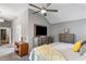 Comfortable main bedroom with a view of the bathroom, plus dressers and a TV for relaxation at 406 Genevieve Dr, Canton, GA 30114