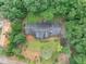 Aerial view capturing the home's location, emphasizing the well-maintained lawn and landscaping at 1050 Birdseye Vw, Locust Grove, GA 30248