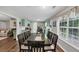 The well-lit dining area provides views to the kitchen and living room, creating an inviting, open feel at 1050 Birdseye Vw, Locust Grove, GA 30248