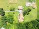 Aerial view of the property featuring well-maintained grounds and multiple buildings on a sprawling lot at 1502 Campground Rd, Mcdonough, GA 30252