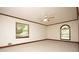 Large bedroom with carpet and windows with natural light at 1502 Campground Rd, Mcdonough, GA 30252