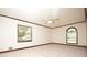 Large bedroom with carpet and windows with natural light at 1502 Campground Rd, Mcdonough, GA 30252