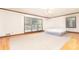 Bright bedroom with hardwood floors, and large windows at 1502 Campground Rd, Mcdonough, GA 30252