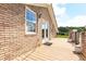 Spacious deck with brick siding offering an inviting outdoor space at 1502 Campground Rd, Mcdonough, GA 30252