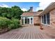 Wooden deck featuring ample space for outdoor relaxation and mature greenery at 1502 Campground Rd, Mcdonough, GA 30252