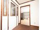 Entryway with brick floor and a view to the white kitchen at 1502 Campground Rd, Mcdonough, GA 30252