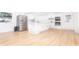 Bright, airy kitchen featuring stainless steel appliances, a center island and all-white cabinets and countertops at 1502 Campground Rd, Mcdonough, GA 30252
