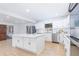 Bright kitchen with white cabinets, stainless appliances, and center island at 1502 Campground Rd, Mcdonough, GA 30252