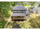 Aerial view of a home with a fenced backyard and a covered porch at 2060 North Avenue Nw, Atlanta, GA 30318