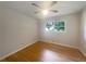 Cozy bedroom with ceiling fan, neutral paint, and hardwood floors at 2584 Favor Sw Rd, Marietta, GA 30060