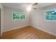 Bedroom with hardwood floors, natural lighting, neutral paint and ceiling fan at 2584 Favor Sw Rd, Marietta, GA 30060