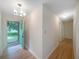 Hallway featuring hardwood floors, fresh paint, and views to the yard through the front door at 2584 Favor Sw Rd, Marietta, GA 30060
