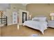 Large bedroom boasts lots of light, spiral staircase, and hardwood floors at 2683 Tritt Springs Ne Trce, Marietta, GA 30062