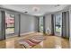 This spacious bedroom has beautiful hardwood floors and lots of natural light from three large windows at 2683 Tritt Springs Ne Trce, Marietta, GA 30062