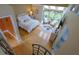 Aerial shot of bright, sun-filled bedroom featuring skylights, hardwood floors, and spiral staircase at 2683 Tritt Springs Ne Trce, Marietta, GA 30062
