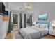 This bedroom is well-lit with lots of natural light and has a large, comfortable bed at 2683 Tritt Springs Ne Trce, Marietta, GA 30062