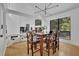 Open dining space with hardwood floors, modern lighting and views of the backyard at 2683 Tritt Springs Ne Trce, Marietta, GA 30062