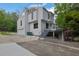 Contemporary home featuring unique architectural details, large windows, and an attached garage at 2683 Tritt Springs Ne Trce, Marietta, GA 30062