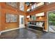Unique kitchen dining area with orange walls, outdoor access, and modern lighting at 2683 Tritt Springs Ne Trce, Marietta, GA 30062