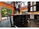 Gourmet kitchen featuring a large island with cooktop, ample cabinets, and easy access to the outdoor patio at 2683 Tritt Springs Ne Trce, Marietta, GA 30062