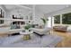 Bright living room features white walls, hardwood floors, and stylish furnishings at 2683 Tritt Springs Ne Trce, Marietta, GA 30062