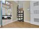 View of bathroom, hall, and spiral staircase on beautiful hardwood floors at 2683 Tritt Springs Ne Trce, Marietta, GA 30062