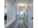 Hallway with wood floors, white doors and access to rooms at 6700 Roswell Rd # 21E, Sandy Springs, GA 30328