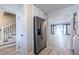 Spacious room with laundry area, access to more space, and staircase at 6700 Roswell Rd # 21E, Sandy Springs, GA 30328